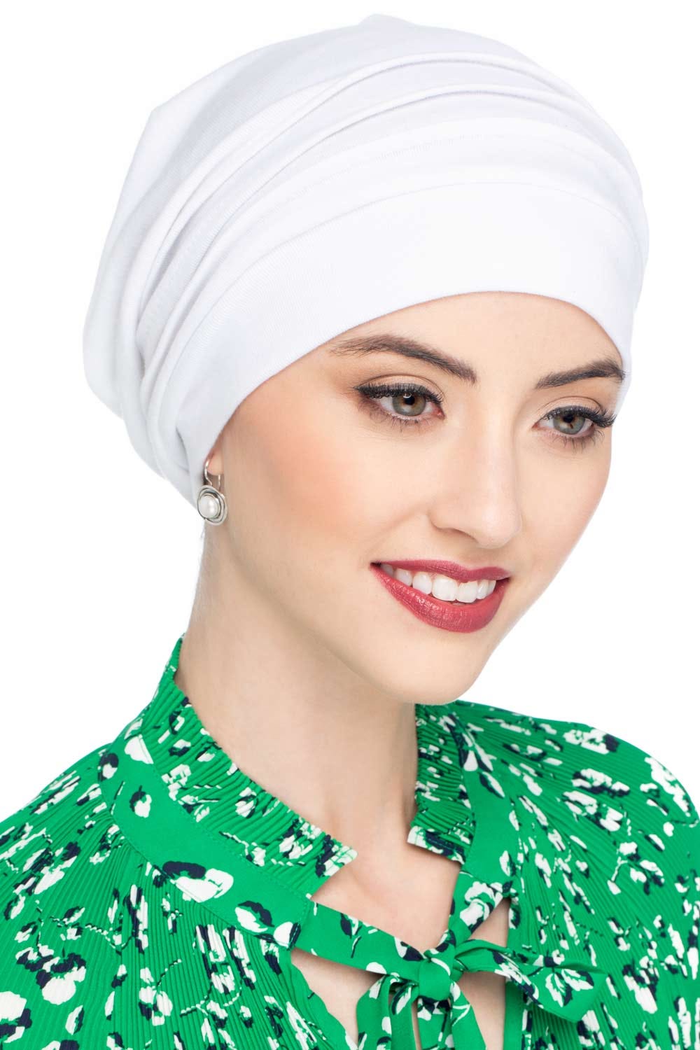 Woman wearing white slouchy style chemo beanie