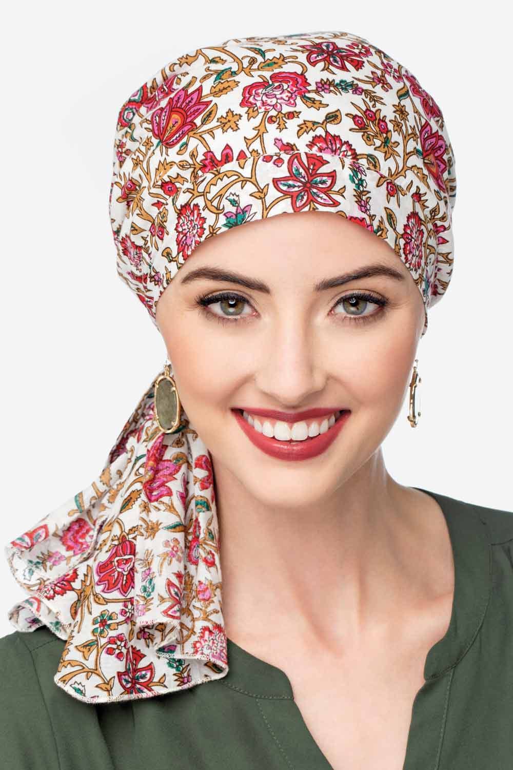Woman in black paisley pre tied head scarf headcovering for cancer patients